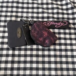 Eh hard black and pink keychain and wallet
